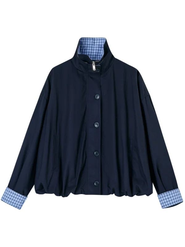 A loose coat with a checkered patchwork design