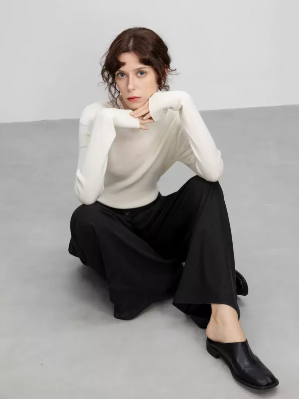 A semi-high-necked wool base layer shirt for women