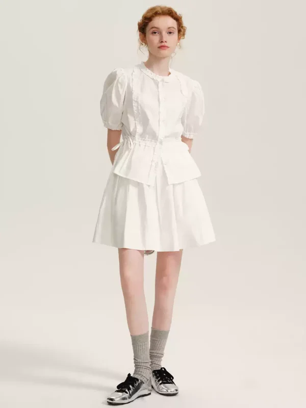 A lady's white short-sleeved shirt