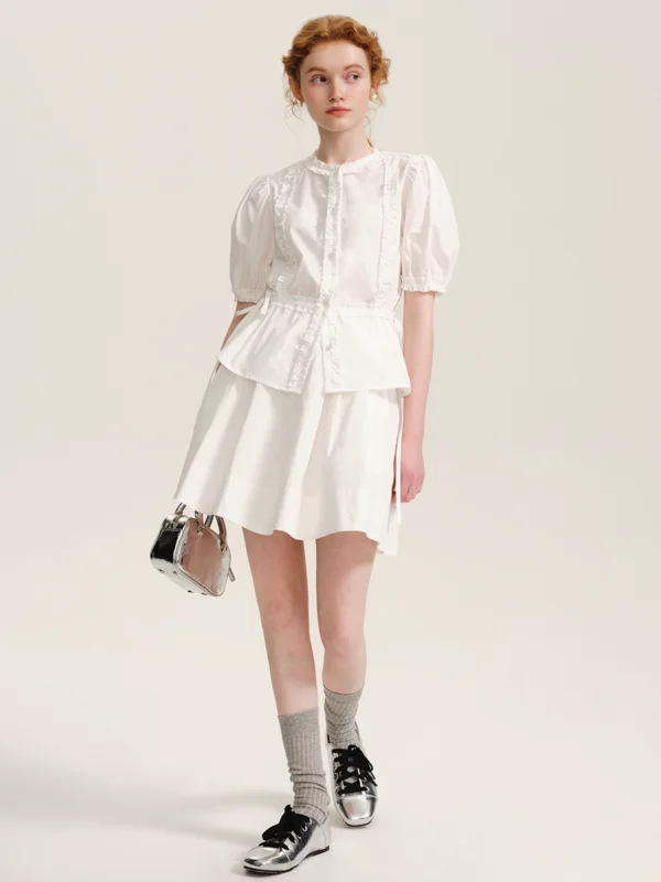 A lady's white short-sleeved shirt