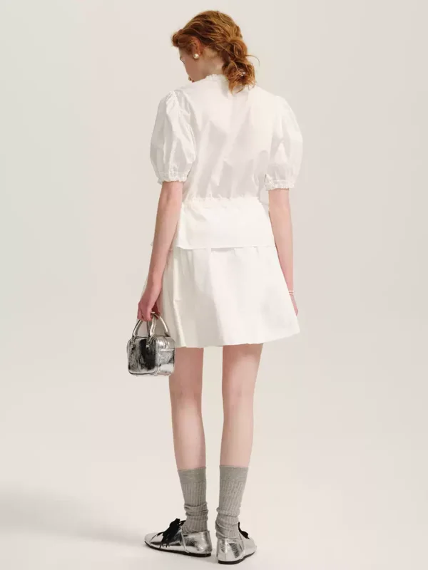 A lady's white short-sleeved shirt