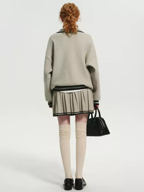 A retro color-blocking knitted suit dress for women