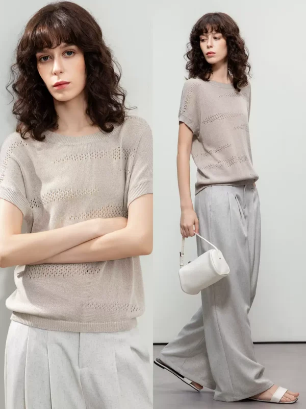 A woman wearing a retro perforated sweater