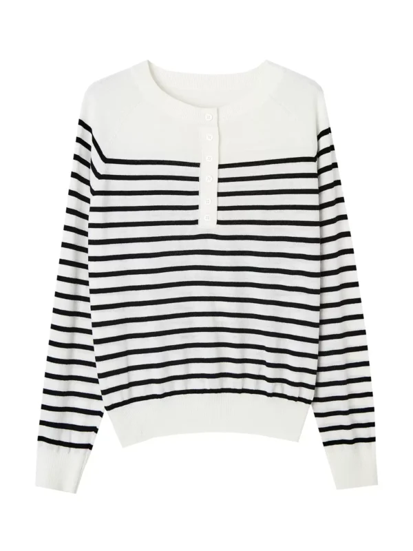 A woman in a striped sweater with an artistic style
