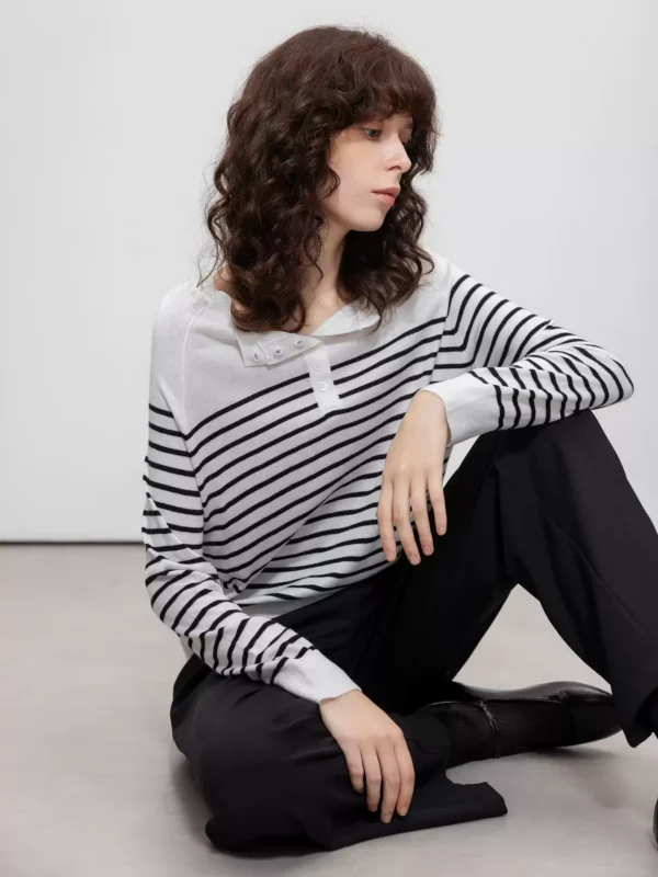 A woman in a striped sweater with an artistic style