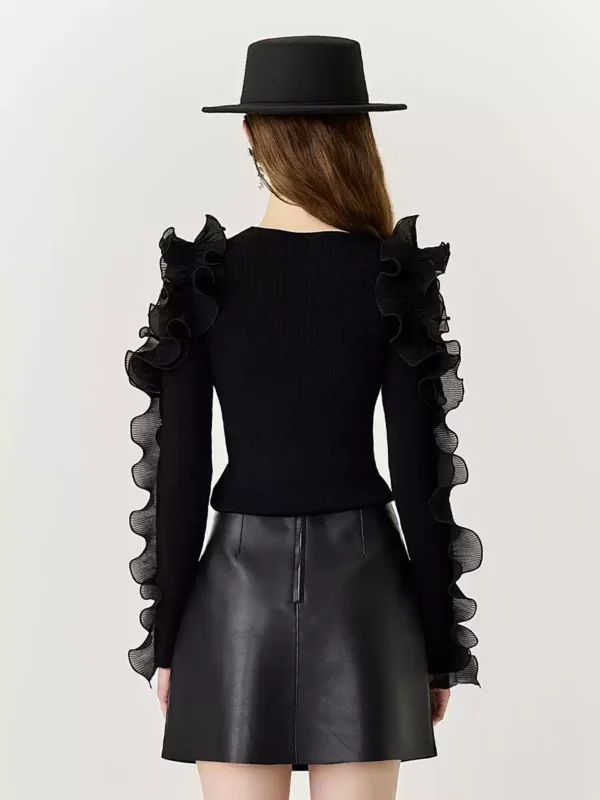 A new black slim-fit knitted top for autumn