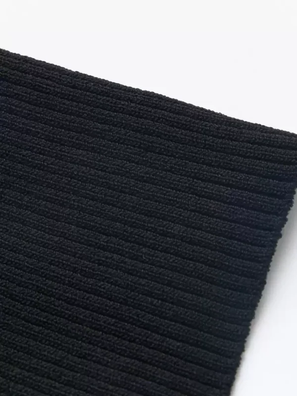 A new black slim-fit knitted top for autumn