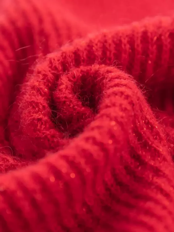 A bright red wool knitted sweater