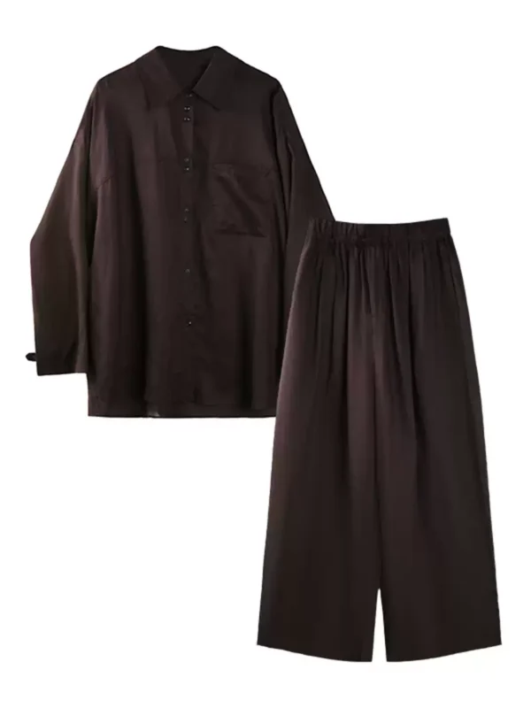 A light shirt and loose trousers suit