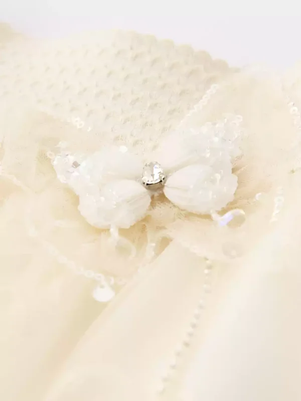 a long A-line skirt with mesh butterfly embroidery - Image 3