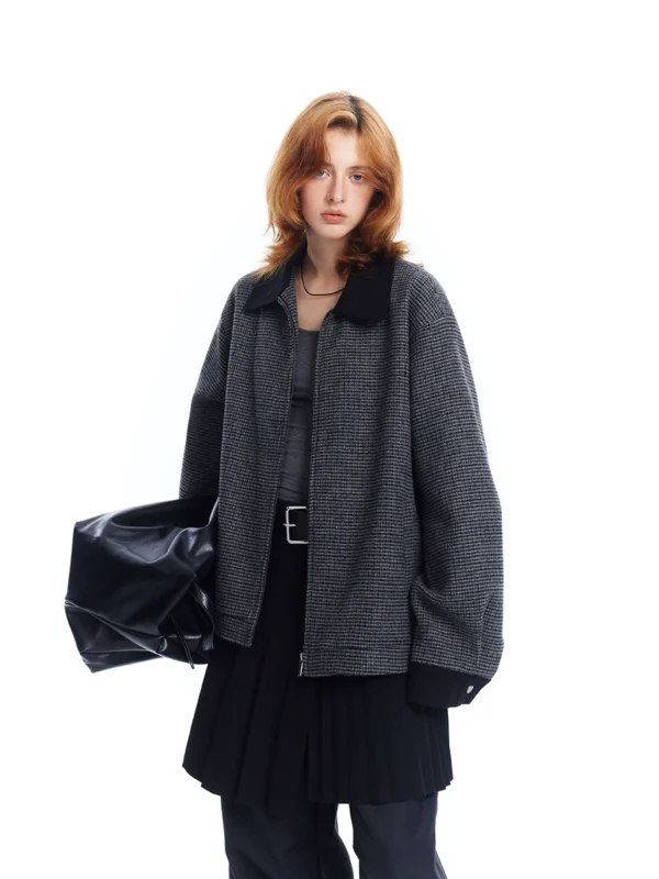 A woman wearing a checkered lapel coat - Image 3