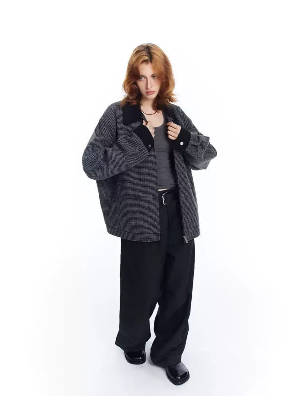 A woman wearing a checkered lapel coat - Image 2
