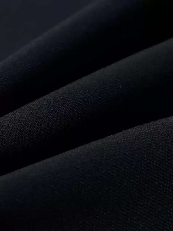 a new black acetate A-line skirt with a rear slit - Image 3