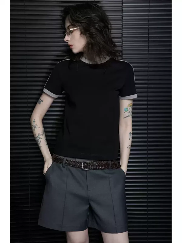 A woman in loose grey high-end shorts - Image 5