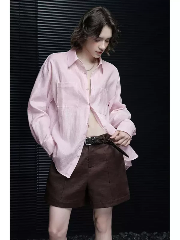 A woman in a pink linen long-sleeved shirt - Image 5