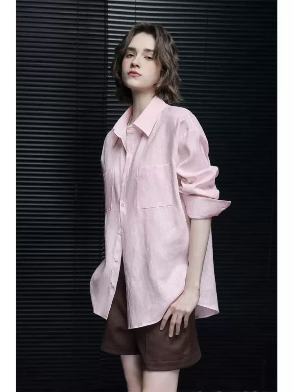 A woman in a pink linen long-sleeved shirt - Image 4