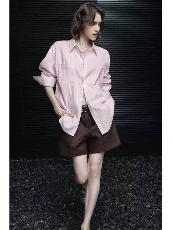 A woman in a pink linen long-sleeved shirt - Image 3