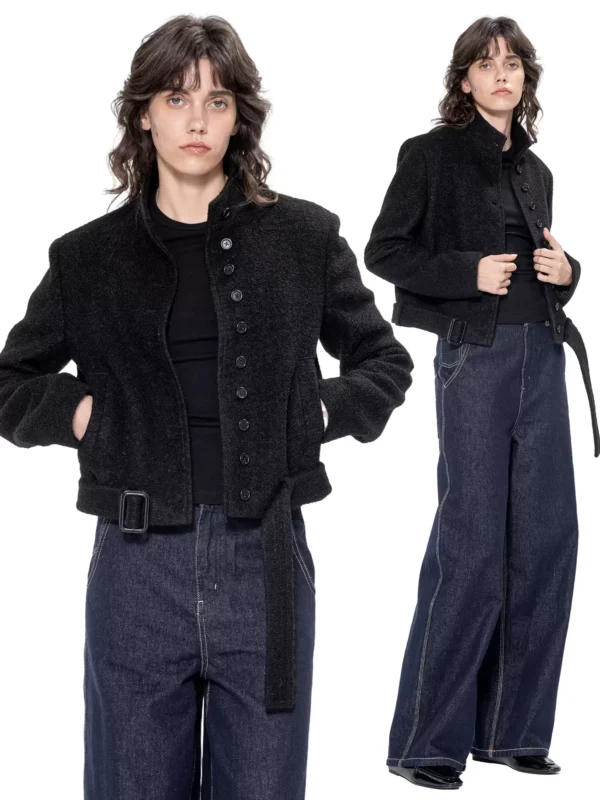 A woman wearing a tight-fitting short woolen coat - Image 2