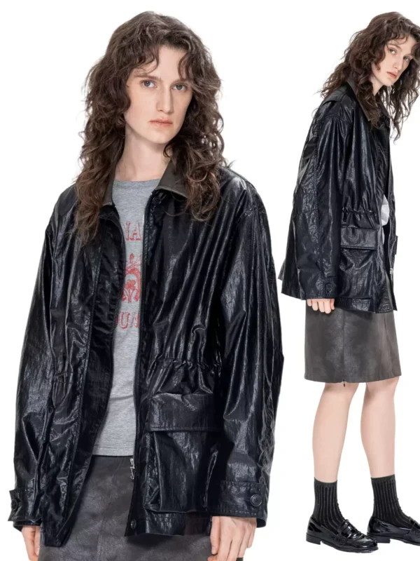 A woman in a windbreaker with a leather collar - Image 3