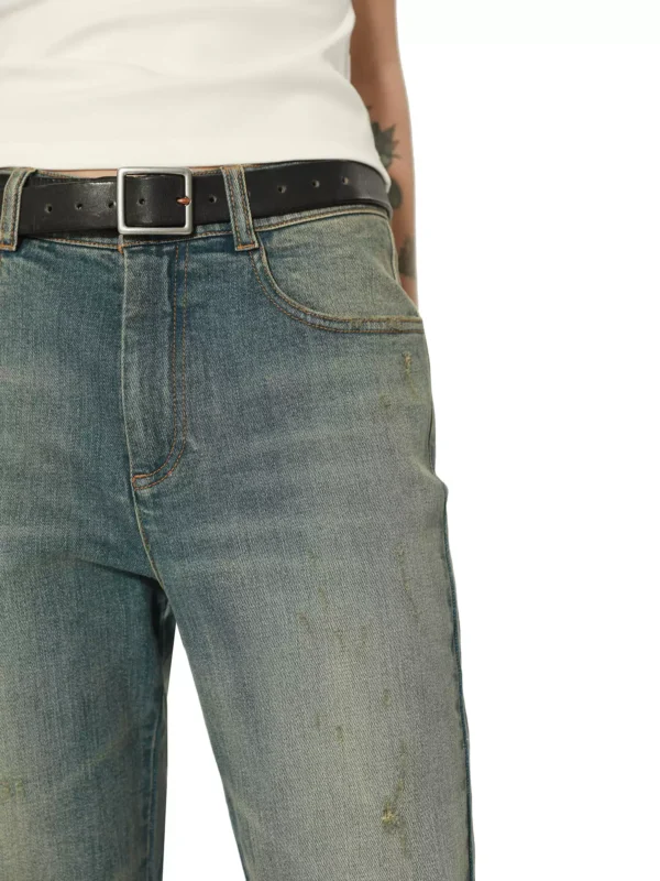 A woman in mid-to-high-waisted slimming jeans - Image 4