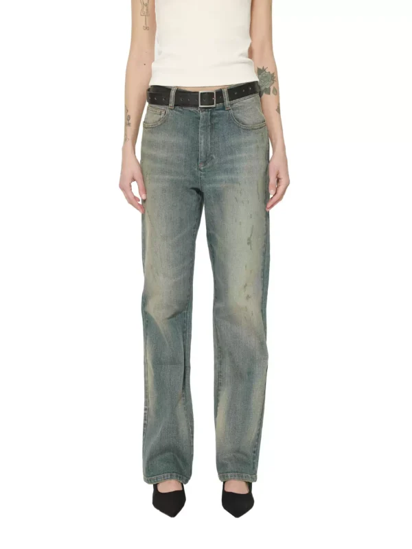 A woman in mid-to-high-waisted slimming jeans