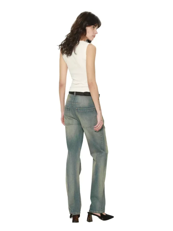 A woman in mid-to-high-waisted slimming jeans - Image 3