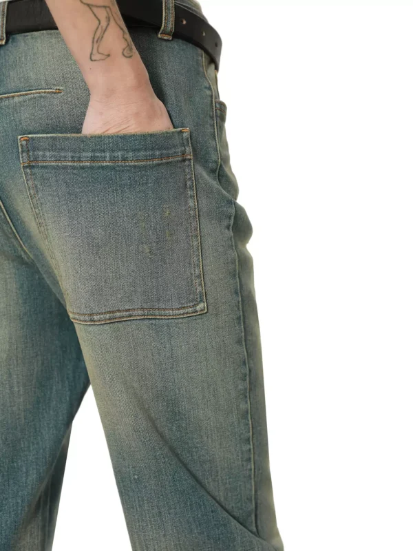 A woman in mid-to-high-waisted slimming jeans - Image 2
