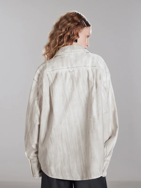A woman wearing an asymmetrical hand-dyed shirt - Image 3