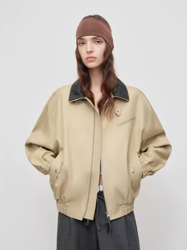 A woman wearing a jacket - Image 3
