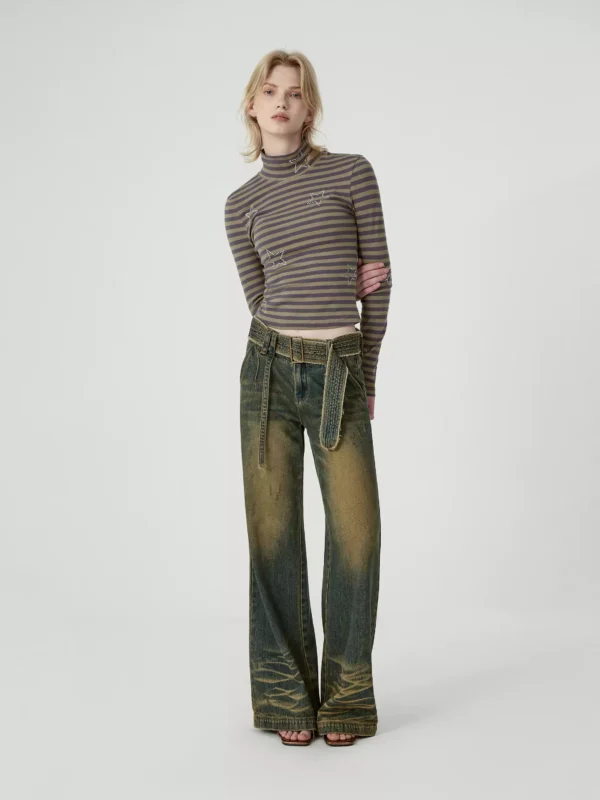 The belt is paired with distressed washed low-rise jeans - Image 2