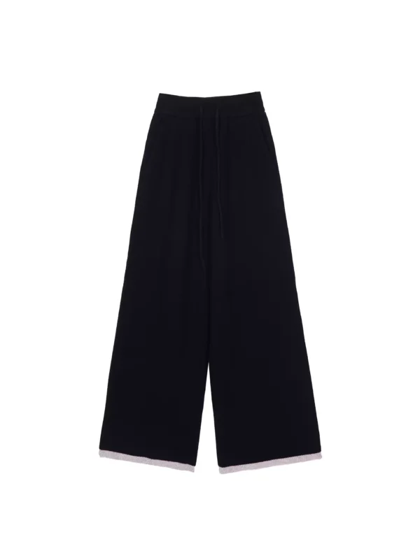 A woman in laid-back black knitted wide-leg pants - Image 4