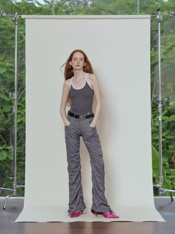 Women in pleated and slightly flared work pants