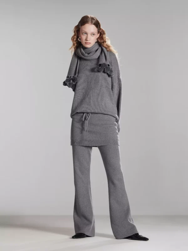 A woman wearing two fake cashmere knitted culottes - Image 2