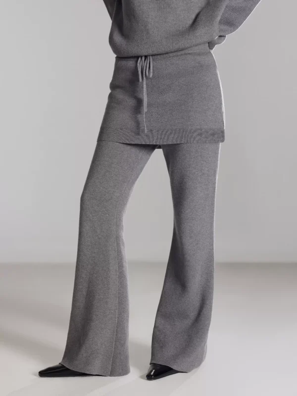 A woman wearing two fake cashmere knitted culottes - Image 3