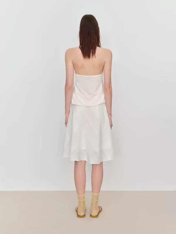 A white, irregular, flowing and drooping umbrella skirt - Image 2