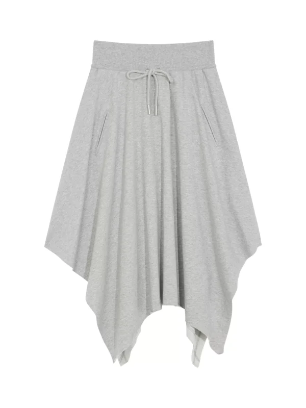 a woman in an irregularly fringed A-line skirt - Image 4